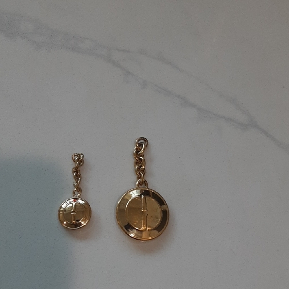 Gucci Gold Tone Zipper Pulls
